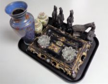 A tray of mother of pearl inlaid papier mache desk stand, pottery figures, Ottoman style figures,