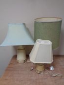 Three 20th century Iden Sussex Pottery table lamps with shades.