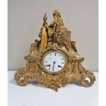 An antique French gilt mantel clock signed Laine A Paris, with enamelled dial,