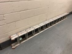 A two-section aluminium extension ladder.