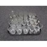A tray of early twentieth century and later glass, etched glass jug and beakers,