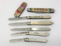 Five 20th century mother of pearl-handled fruit knives with silver blades and two Royal