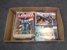 A box containing late 20th century comics to include Marvel The Punisher, Eagle, Judge Dredd,