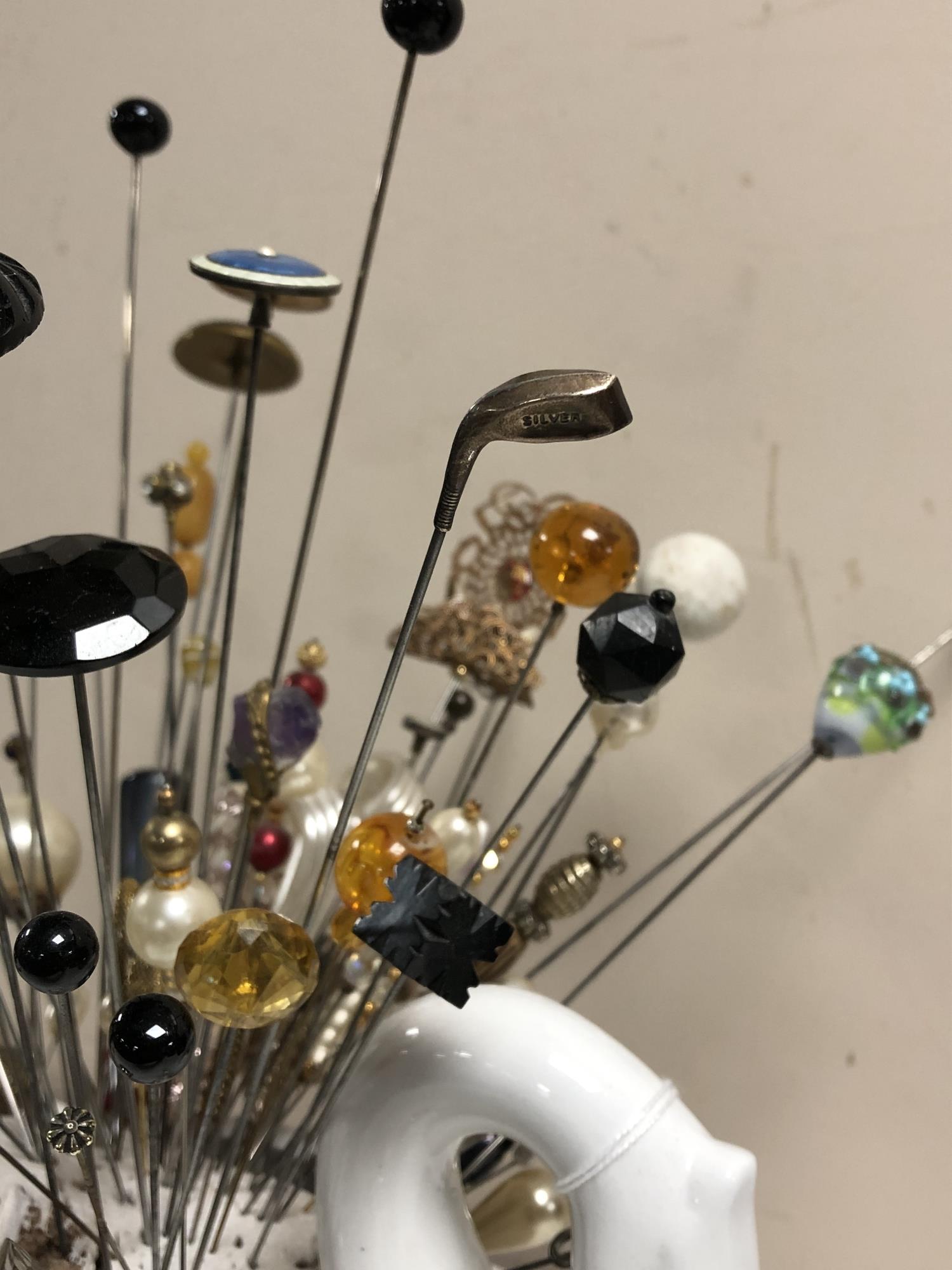 A collection of nearly one hundred stick pins and hat pins, some silver examples, - Image 5 of 5