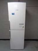 A Bosch Exxcel upright fridge freezer.