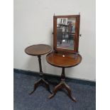 A Victorian inlaid toilet mirror together with two mahogany pedestal wine tables.