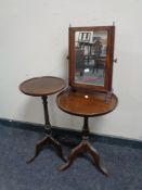 A Victorian inlaid toilet mirror together with two mahogany pedestal wine tables.