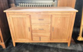 A contemporary sideboard, height 85 cm, depth 47 cm, length 137 cm.