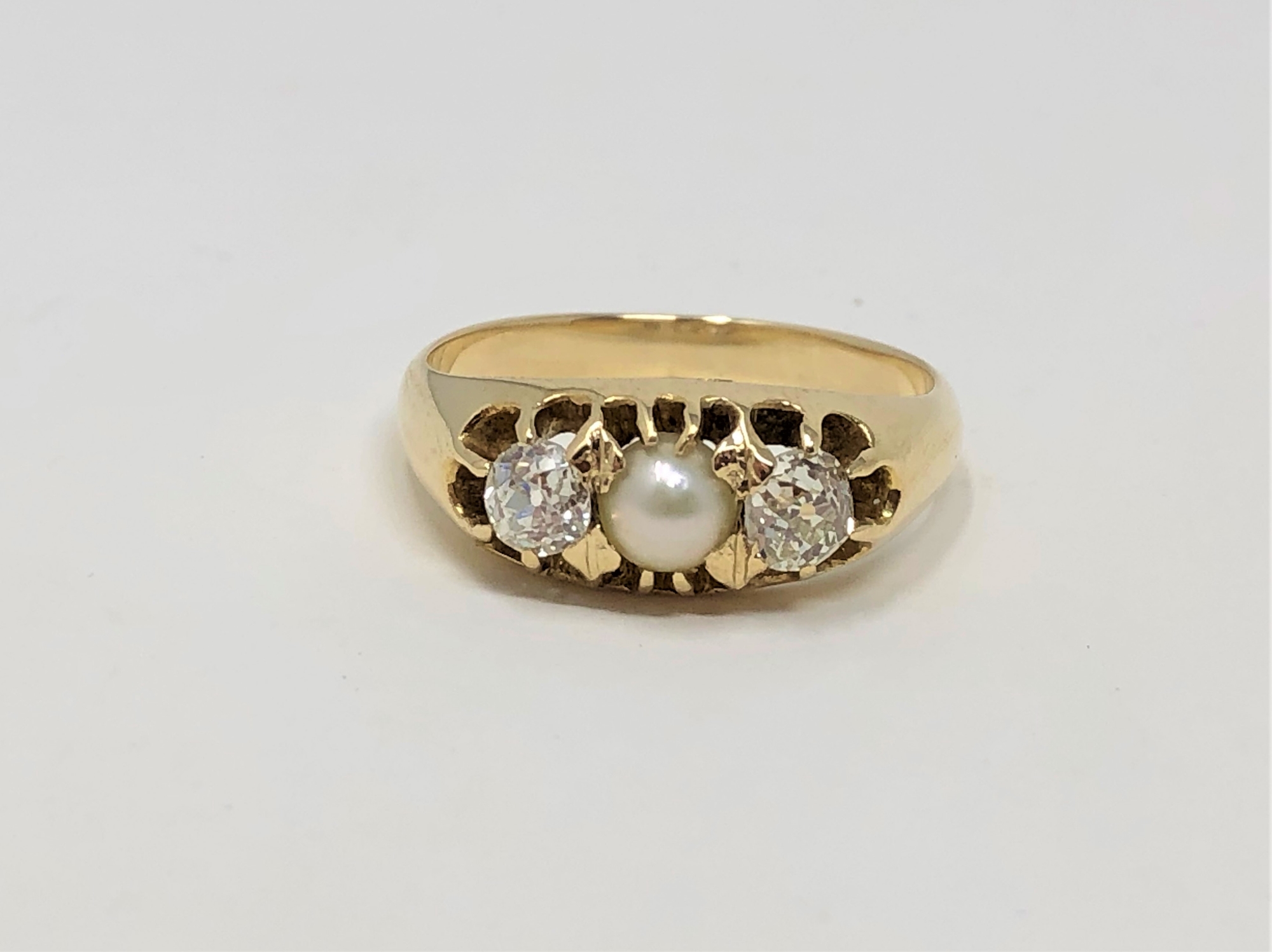 An 18ct gold pearl and old cut diamond ring, total diamond weight approximately 0.