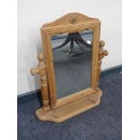 A pine dressing table mirror.