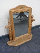 A pine dressing table mirror.