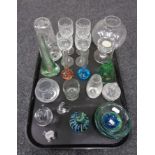 A tray of assorted glass ware, 1970's bud vases, Mdina glass dish and paperweights,
