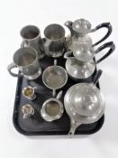 A tray containing antique and later pewter to include James Dickson Cornish pewter tea ware,