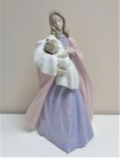 A Nao figure of a Mother with child no.