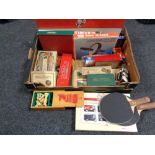 A box of assorted board games, boxwood chess set, draughts,
