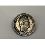 An 1831 5 Francs coin