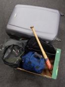 An Eminent luggage case together with a box containing a baseball bat,