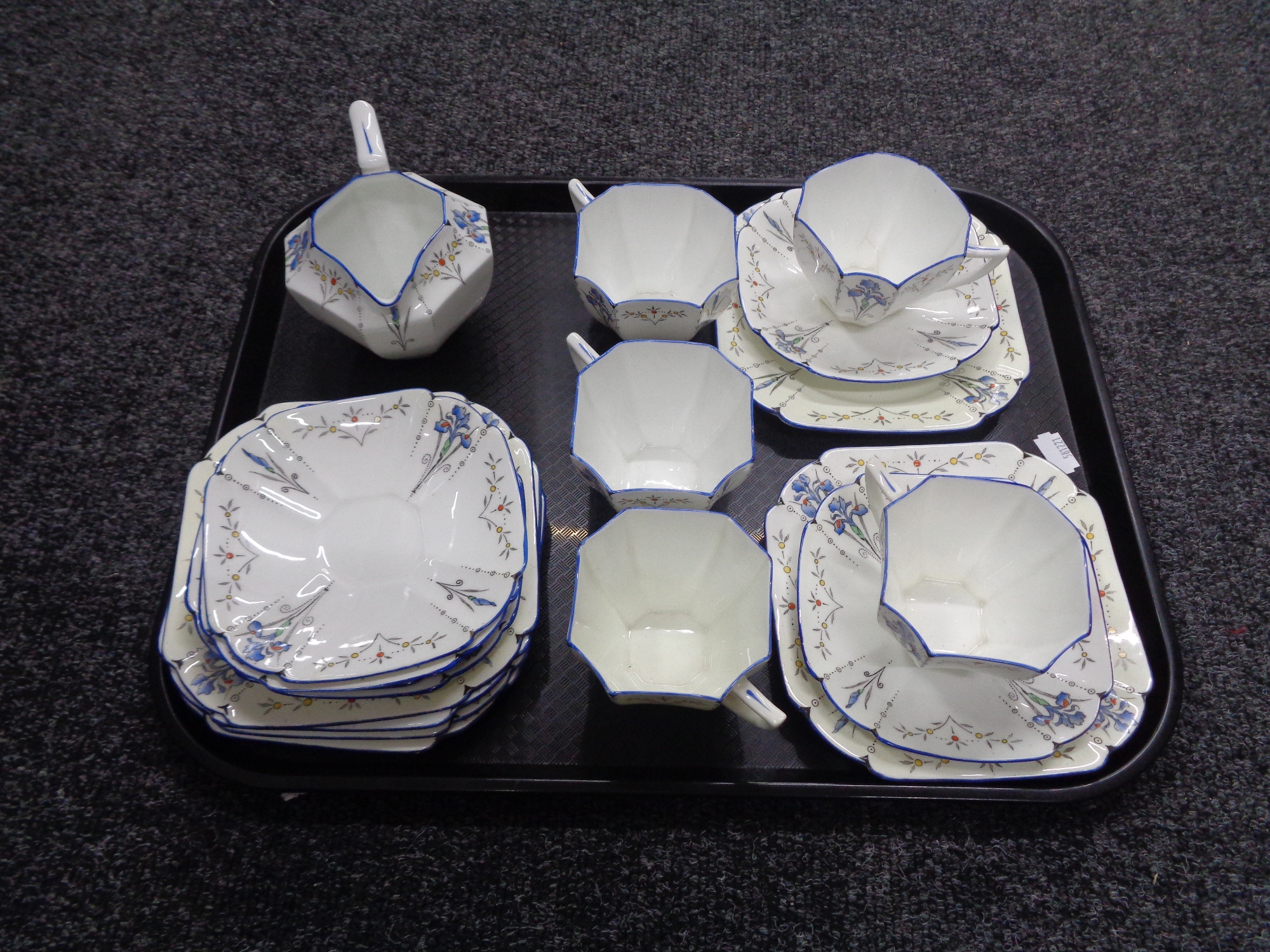 A tray containing an 18 piece Shelley hand painted bone china tea service.
