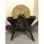 A late Victorian War Department sword sharpening stone on cast iron stand,