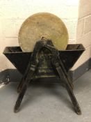 A late Victorian War Department sword sharpening stone on cast iron stand,
