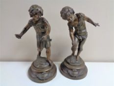 A pair of early twentieth century French spelter figures of children (a/f)