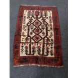 A Baluchi rug 120 x 85 cm