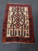 A Baluchi rug 120 x 85 cm
