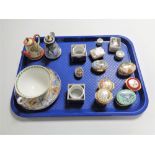 A tray containing miscellaneous items to include Halcyon Days enamel pill and trinket boxes,
