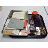 A tray of vintage First Aid case, Leningrada boxed light meter, pocket warmer,
