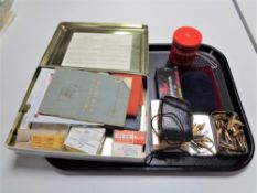 A tray of vintage First Aid case, Leningrada boxed light meter, pocket warmer,