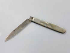 A William IV silver and mother of pearl fruit knife bearing nameplate 'J.