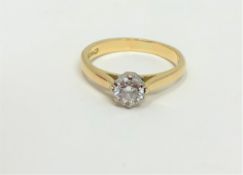 An 18ct gold solitaire diamond ring, approximately 0.