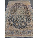 An Isfahan design rug on blue ground,