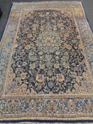 An Isfahan design rug on blue ground,