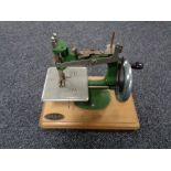 A mid century child's grain sewing machine