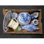 A box containing miscellaneous china to include blue and white willow pattern plates,