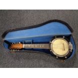 An eight-string banjolele by John Gray and Sons of London, in fitted case.