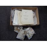 A box containing a large quantity of 20th century world stamps, loose and on sheets.