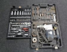 A cased socket set together with a further cased Titan rotary hammer drill