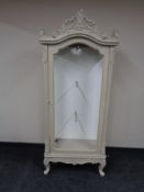 A French style painted display cabinet.