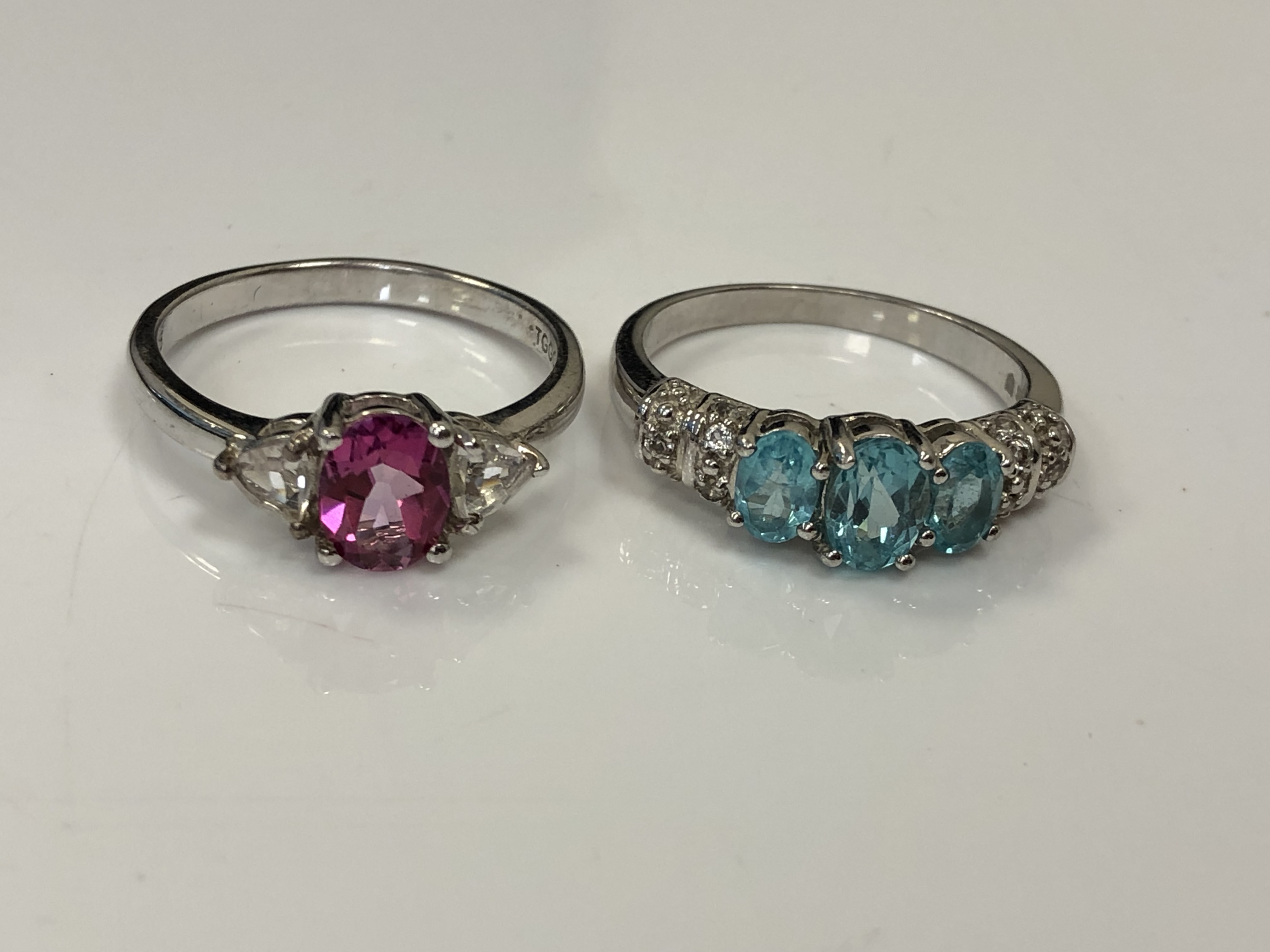 Two silver gem set dress rings.