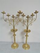 A pair of decorative brass five way candelabra, height 71.5 cm.