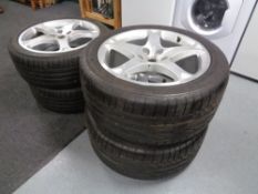 A set of four 19'' alloy wheels, two with Bridgestone Potenza 285/40R19 tyres,