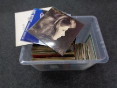 A box of vinyl LP's and 45's to include Tracy Chapman, Deacon Blue, New Order, Michael Jackson,