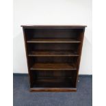 A set of Webber Furniture oak open bookshelves.