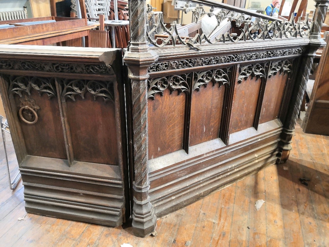 A two section end panel in Gothic revival carved oak, height 102 cm to the rail, - Image 2 of 4