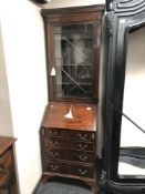 A 19th century mahogany narrow bureau bookcase.