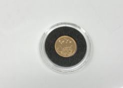 A 2009 gold quarter sovereign