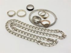 A quantity of jewellery items to include - silver flat link necklace (48g), Ted Baker bangle,