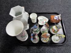 A tray containing assorted china to include six flower encrusted bird and butterfly decorated bells,